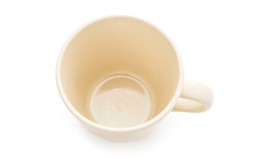 Beige cup on white background