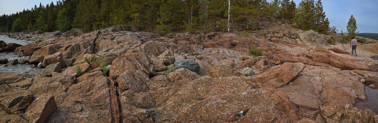 Stony coast on the north side of the Klampenborg peninsula at Stockvik in Sweden, Europe
