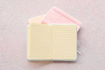 Blank open notebook on light background