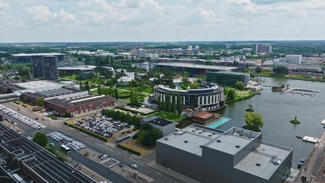 Drone shot of The Autostadt ( Automobile City) , a visitor attraction adjacent to the Volkswagen factory in Wolfsburg, Germany, with a prime focus on automobiles. Volkswagen car museum, driving tracks