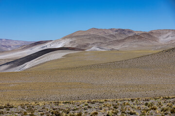Picturesque landscape along the route to El Peñon - wild nature of the remote highlands in Argentina, South America - Discovering the Puna