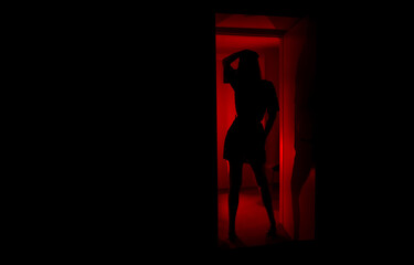 Prostitute waiting for the client. Red-light district.