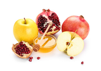 Ripe apples, pomegranates and sweet honey on white background. Rosh hashanah (Jewish New Year) celebration