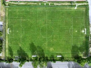 Zenith aerial view of a green grass soccer field © DVisions