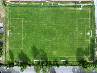 Zenith aerial view of a green grass soccer field