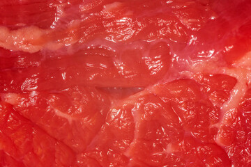 Beef raw meat texture, close-up. Macro shot Fresh raw piece of beef.