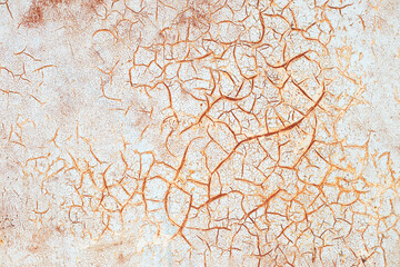 Rusty metal abstract background. Texture of an old grunge metal plate with cracked paint.