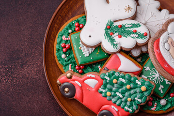 Beautiful delicious Christmas gingerbread on a concrete texture background