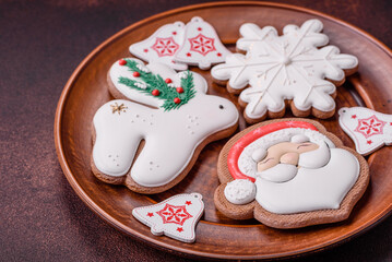 Beautiful delicious Christmas gingerbread on a concrete texture background