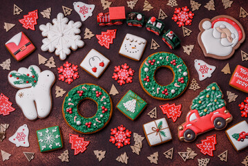 Beautiful delicious Christmas gingerbread on a concrete texture background