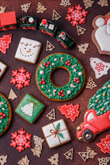 Fototapeta na wymiar Beautiful delicious Christmas gingerbread on a concrete texture background