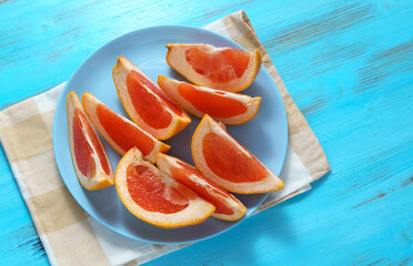 Cutting Grapefruit, flat lay. The Concept Of Healthy Eating. Selective focus