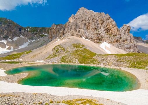 Monte Redentore and Pilato lake (Italy) - The landscape summit of Mount Redentore with Pilato lake, between the regions Umbria and Marche. One of the highest peaks of the Apennines, in Monti Sibillini
