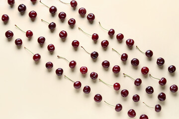 Many sweet cherries on beige background