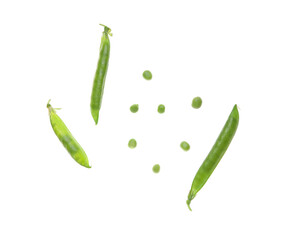 Flying green pea pods on white background