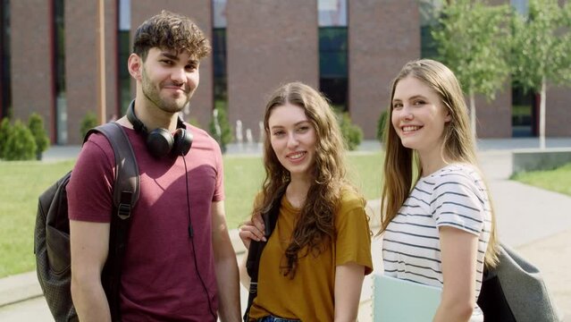 Portrait of group of an university students standing outside the university campus. Shot with RED helium camera in 8K. 