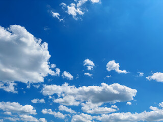 Clouds in the bright sky. There is space for text.