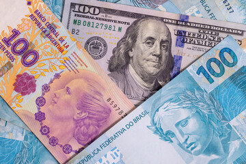 Miscellaneous banknotes (US dollar, Brazilian real, Argentine peso)
