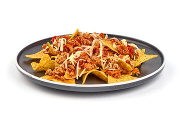 Plate of corn chips nachos with fried minced meat and cheese, isolated on white background.