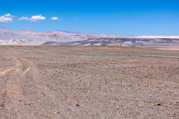 Puna - off road adventure on the way to the Campo de Piedra Pómez, a bizarre but beautiful landscape with a field of pumice, volcanic rocks and dunes of sand in the north of Argentina, South America 