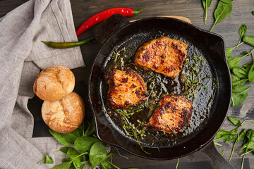 Pork tenderloin steak in cast iron skillet