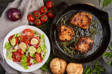 Pork tenderloin steak in cast iron skillet