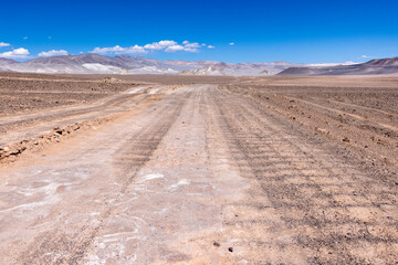 Puna - off road adventure on the way to the Campo de Piedra Pómez, a bizarre but beautiful landscape with a field of pumice, volcanic rocks and dunes of sand in the north of Argentina, South America 