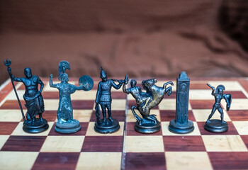Antique brass made chess set based on greek mythology 