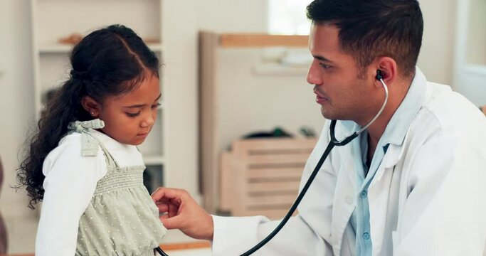 Stethoscope, doctor and girl in a consultation, kid and pediatrician with a breathing checkup and diagnosis. Male person, female child and healthcare professional with treatment, medical and talking