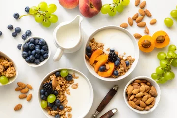 Foto op Plexiglas Two healthy breakfast bowl with ingredients granola fruits Greek yogurt and berries top view. Weight loss, healthy lifestyle and eating concept © kucherav