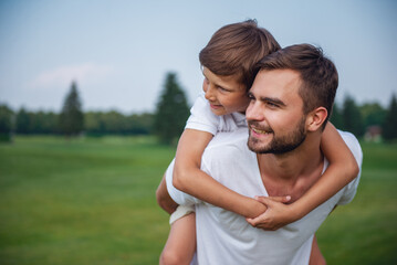 Fototapeta premium Dad and son resting outdoors