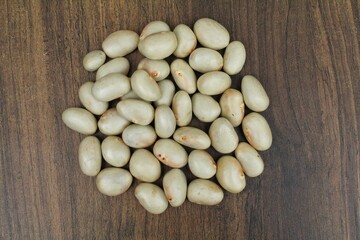 Jackfruit seeds on wooden background top view 