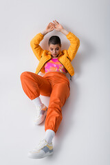colorful clothes, outerwear, female model posing in casual attire, young woman with short hair and...