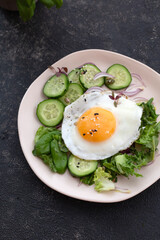 fried egg with salad