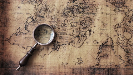 Top view of a magnifying glass placed on a vintage world map. travel travel concept, Old map with an magnifying glass