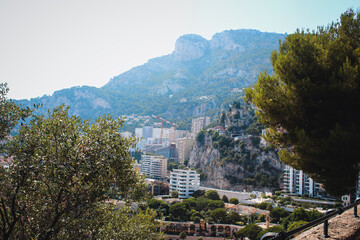Obraz premium Houses, mountains and a beach on the shore of the Mediterranean Sea, Monaco
