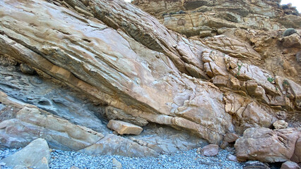 The close-up relief of the rocks texture with layers