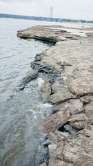 Rocky shore, shale rock, rocky river bank, rocks on the shore