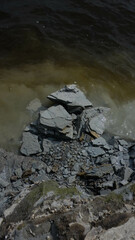 Rocky shore, shale rock, rocky river bank, rocks on the shore