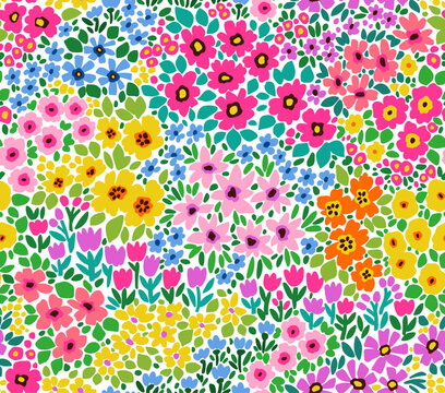 Cute floral pattern in the small flowers. Seamless vector texture. Trendy bright template for fashion prints. Printing with small multicolor flowers. White background. Stock print. © ann_and_pen