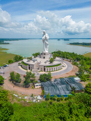 Aerial view of Our lady of Lourdes Virgin Mary catholic religious statue on a Nui Cui mountain in Dong Nai province, Vietnam.