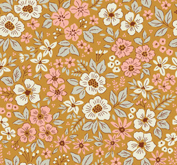 Vintage floral pattern in small abstract flowers. Small rose pink and white flowers. Gold background. Ditsy print. Floral seamless background. Liberty template for fashion prints. Stock pattern.