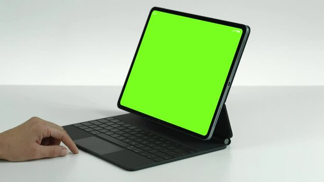 working with green screen tablet and keyboard