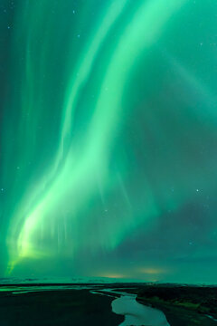 Aurora borealis over river