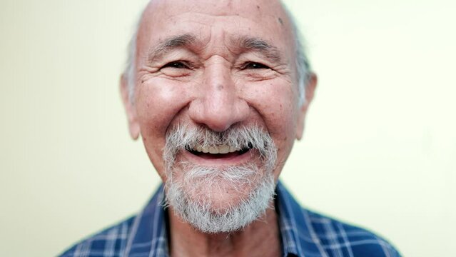 Happy Asian senior man smiling on camera - Elderly people, community concept