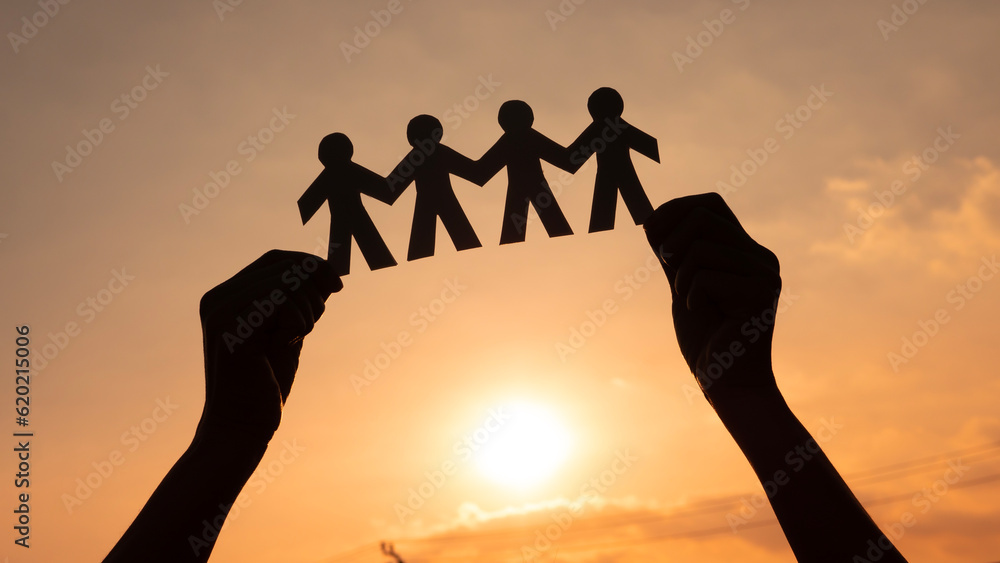 Wall mural Teamwork and relations concept. symbolic of paper chains. People are connected to each other. Concept of human role. The concept of teamwork, family home, teamwork, society, social network,