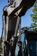 Excavator close up machinery detail, engineering, hydraulic parts