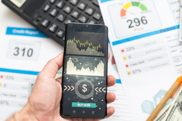 Credit score report with keyboard and pen