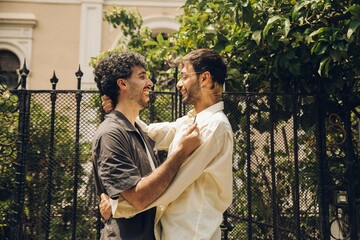 men couple celebrating they are having new home