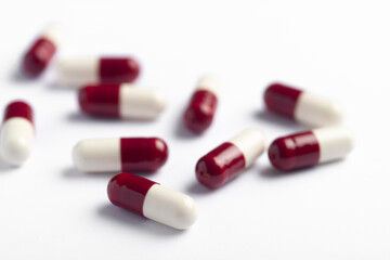 Drug prescription for treatment medication. Pharmaceutical medicament,  Pharmacy theme, Heap of red white medicament